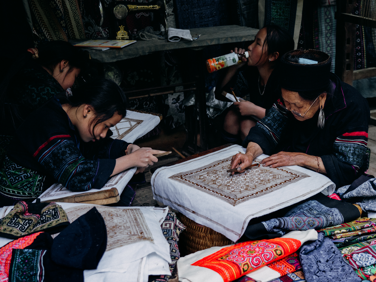 Handmade embroidery art being crafted by skilled artisans